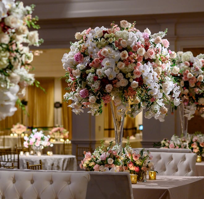 White, pink and pastel floral centerpiece created and designed by Plants N' Petals.