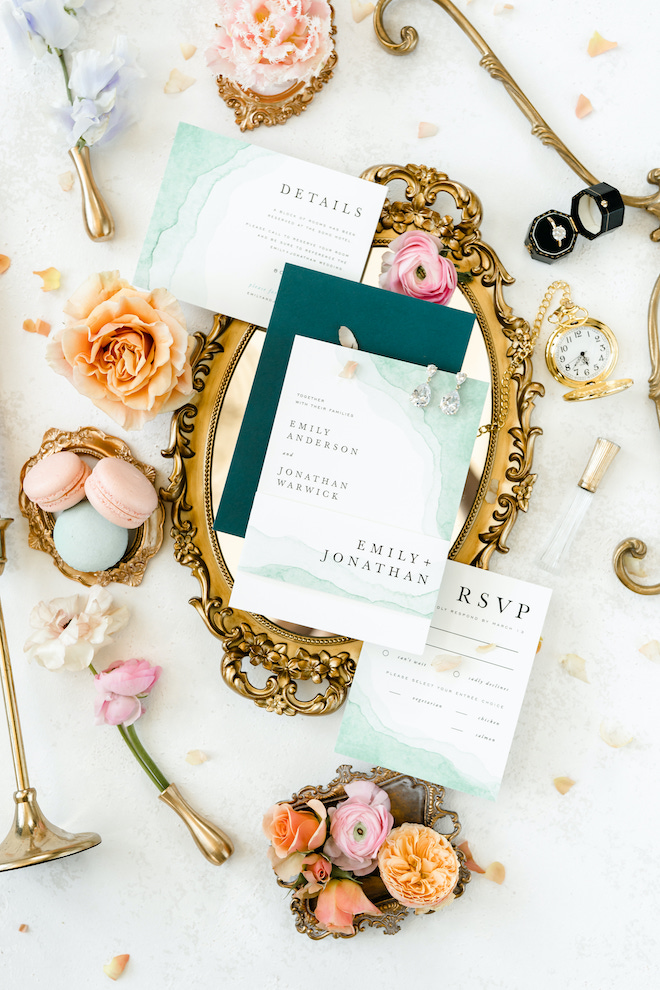 Turquoise and mint colored stationery and invitations for an enchanting garden wedding editorial.