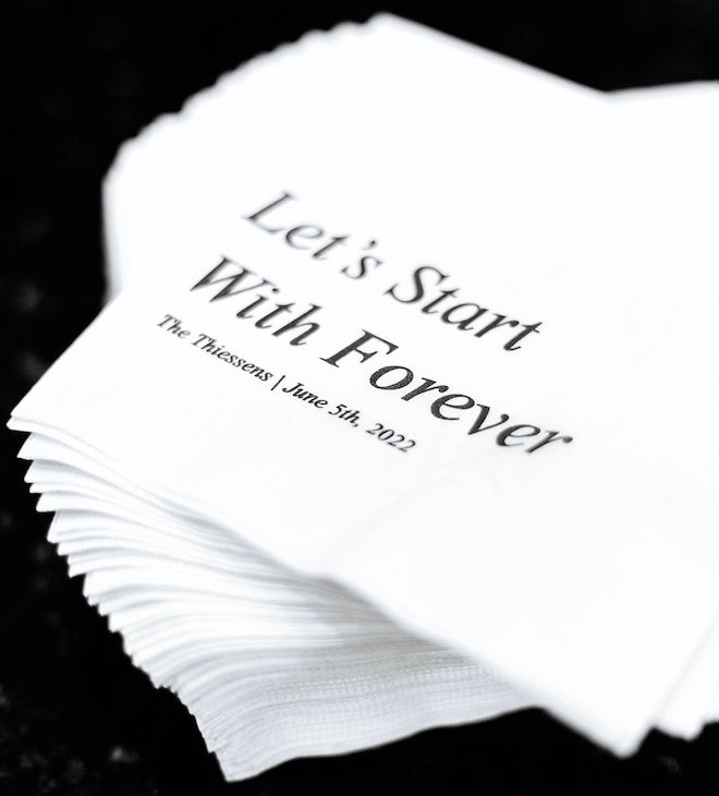 Napkins that say "Let's Start With Forever".