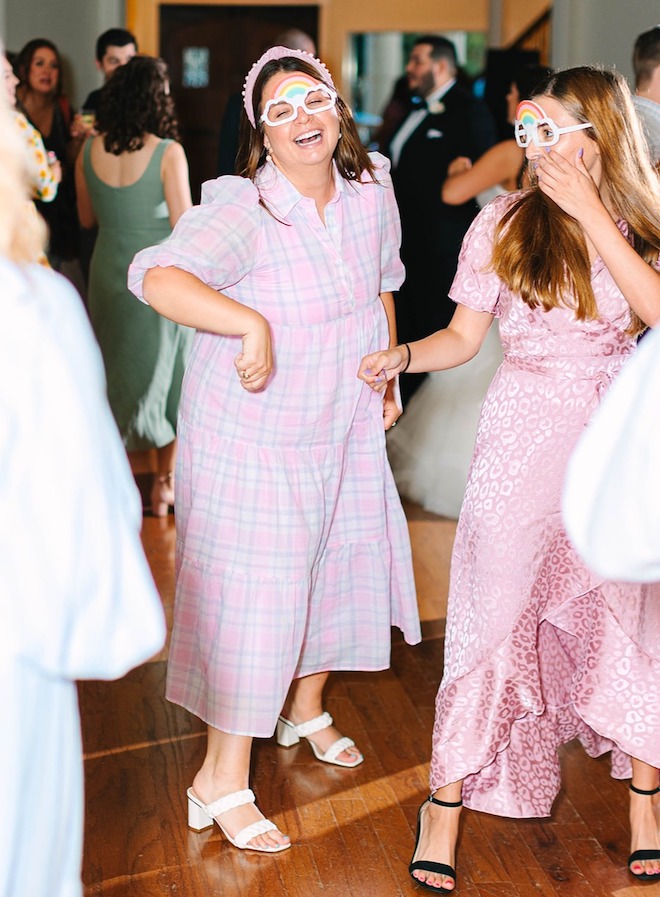 Guests dancing at the reception.