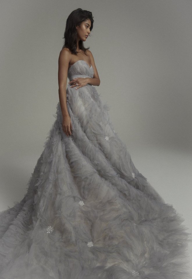 A gray ballgown dress with a tulle skirt with crystals. 