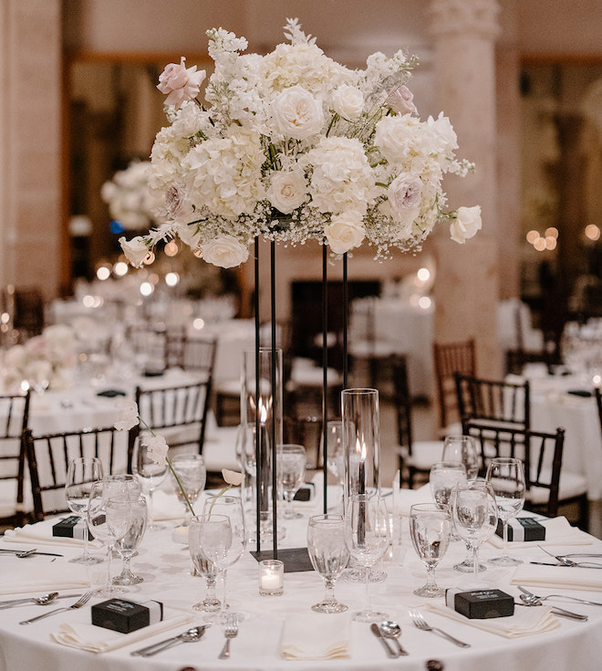 Tall blush and white floral centerpiece on a banquet table at The Bell Tower on 34th.