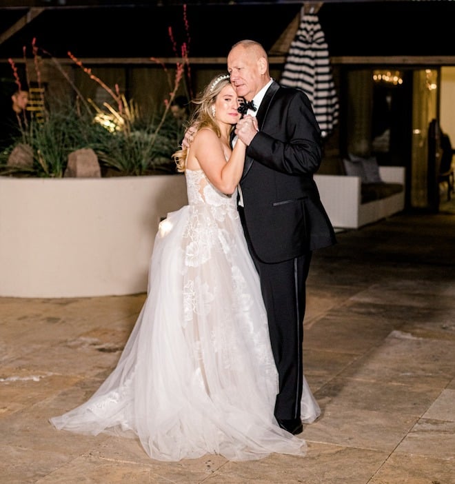 The bride and her father having an emotional moment while dancing. 