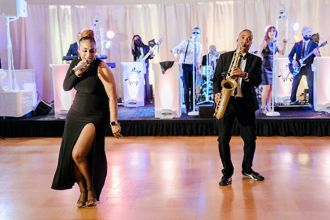 Danny Ray and The Atlantic Street Band musicians on the dance floor.