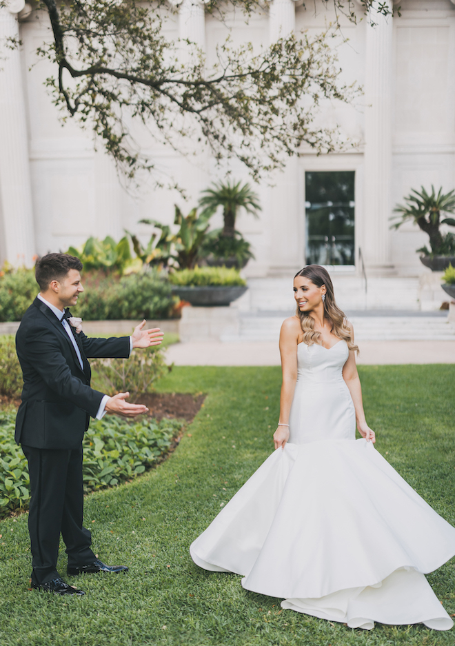 The bride and grooms first look before their glamorous wedding celebration.