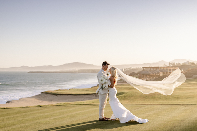 The bride and groom aside the Sea of Cortez at Los Cabos.