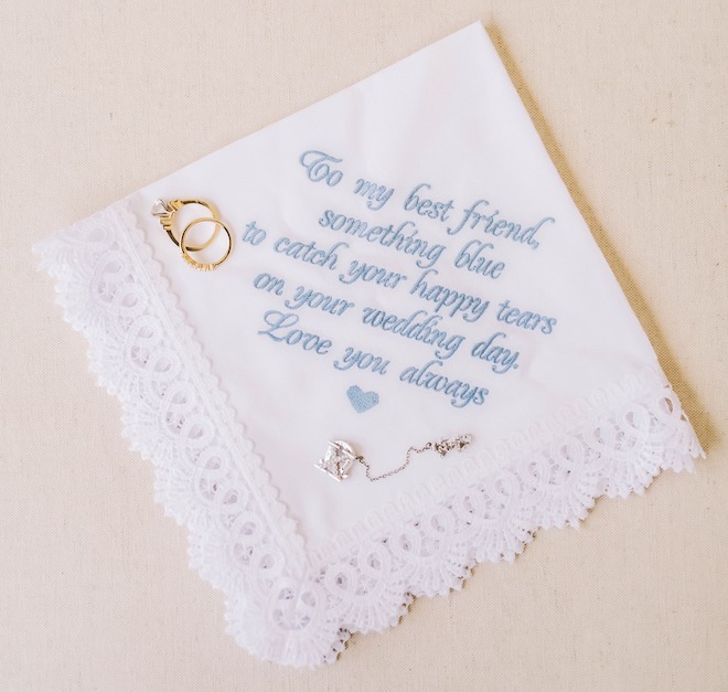 A handkerchief with an embroidered note.