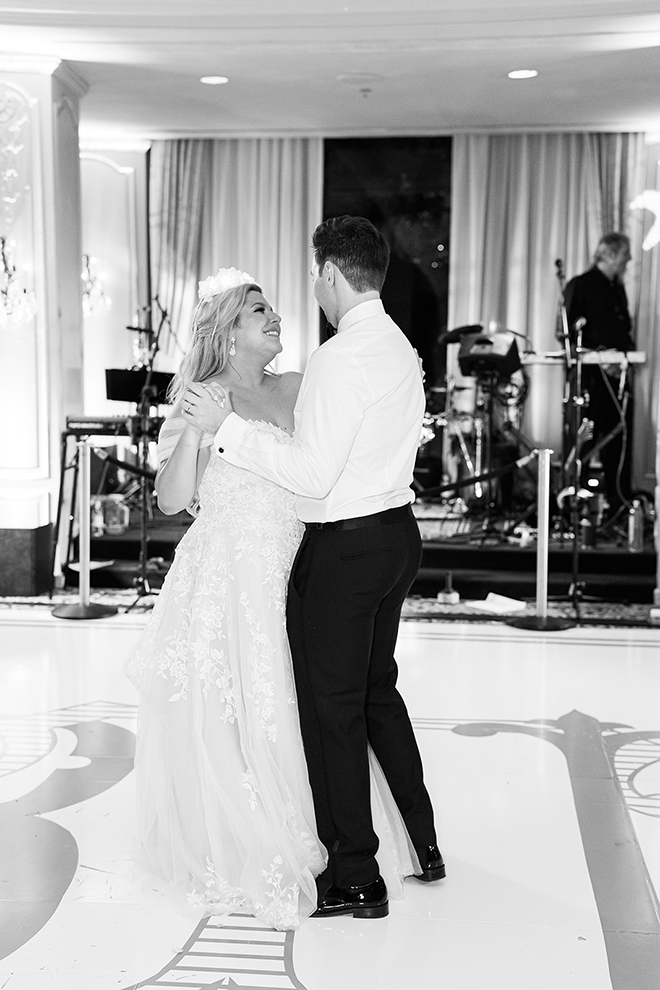 Bride and groom have a last dance at their wedding reception in the Houston Museum District.