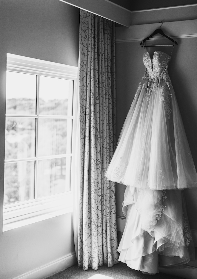 The bride's gown hanging.