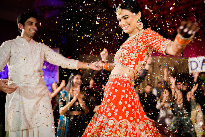 The bride and groom dancing at the Mehndi.