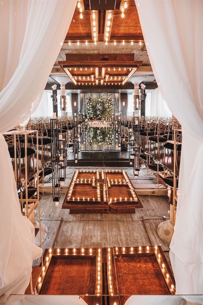 Black, champagne and blush wedding ceremony at The Astorian.