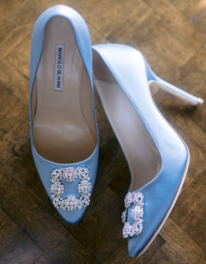 Light Blue Manolo Blahnik Heels with a jewel buckle on the toe.