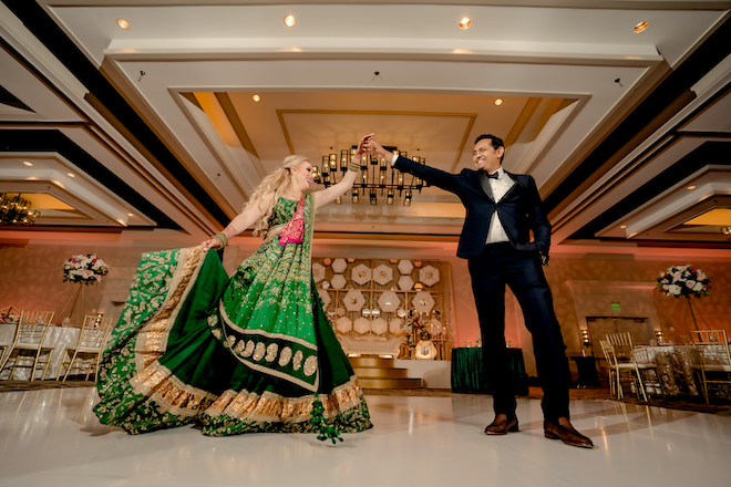 The bride and groom dancing in the ballroom of Hyatt Regency Lost Pines Resort and Spa.