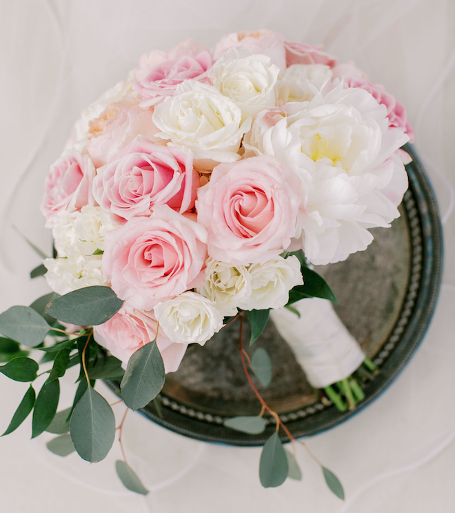 A bouquet of pink and white roses.