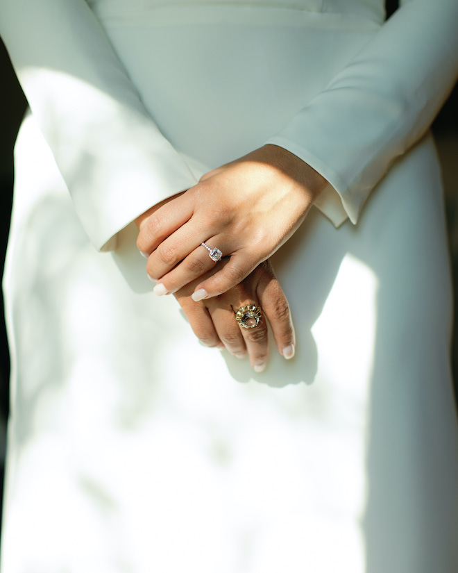 A close-up of the brides hands, showing her ring from Shaftel Diamonds. 