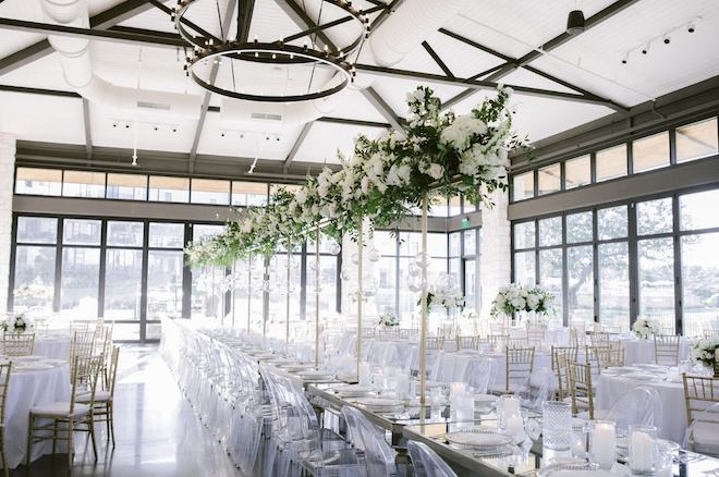 A white-themed wedding reception in the hill country pavilion.