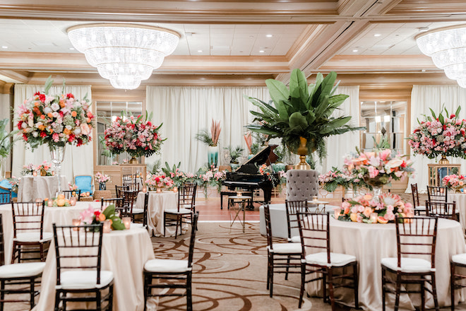The San Luis Resort ballroom decorated with florals, a rehearsal dinner spot near Houston.