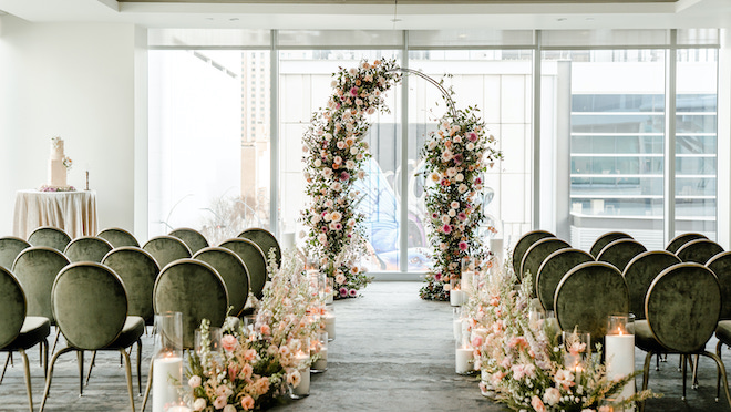 A light and bright ceremony space at the Laura Hotel.