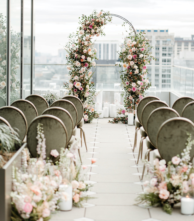 The light & airy ceremony space on the rooftop of the Laura hotel.