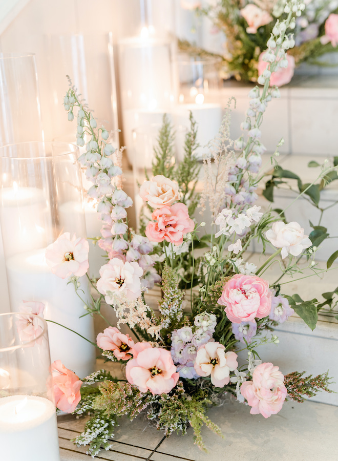 Light and bright florals lining the staircase.