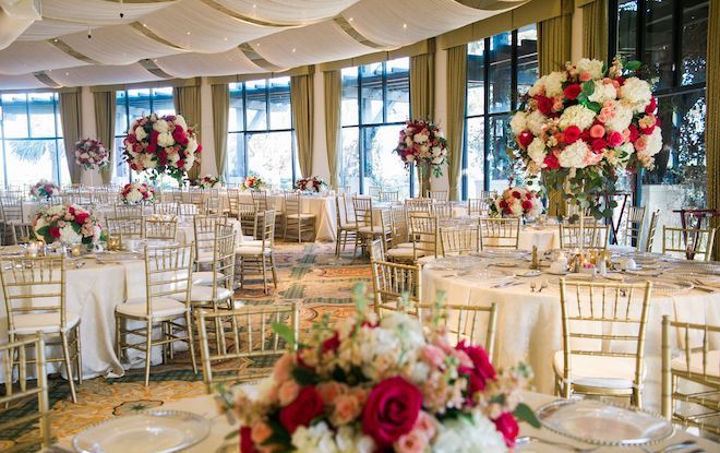 Round tables decorated with blooms at the Grand Galvez.