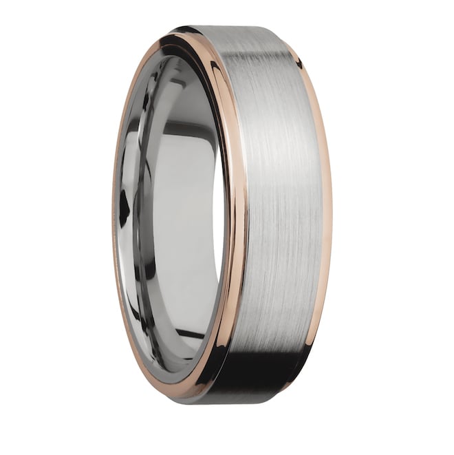 A chrome band with a rose gold inlay for a groom from I W Marks Jewelers.