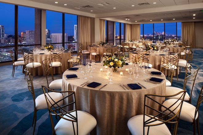 The ballroom at Westin Oaks Houston at the Galleria with floor to ceiling windows overlooking the Galleria.