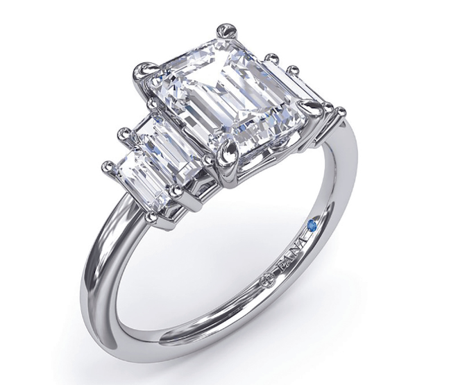 Emerald cut five stone engagement ring