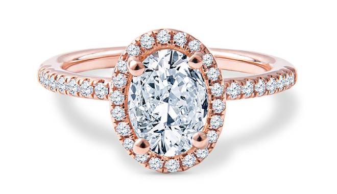 A rose gold and diamond oval engagement ring from Shaftel Diamonds.