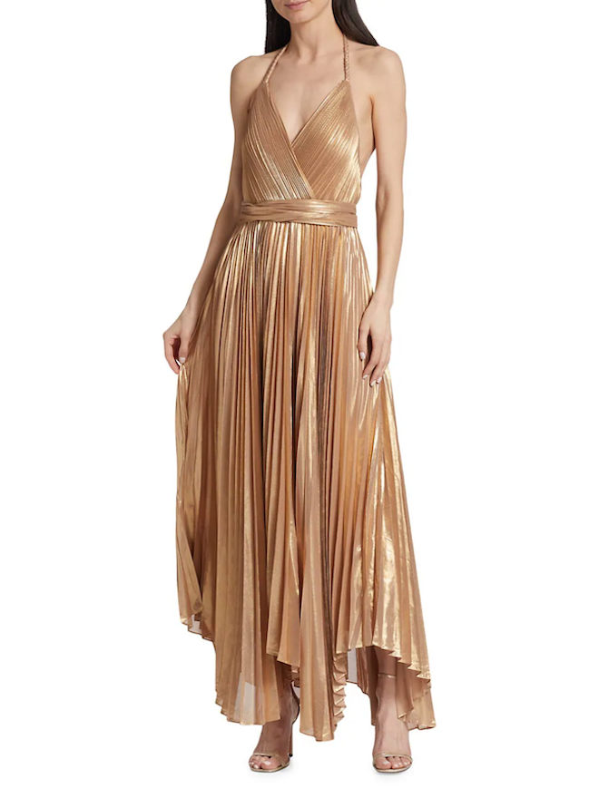 A gold shimmery gown, perfect for a rehearsal dinner dress. 