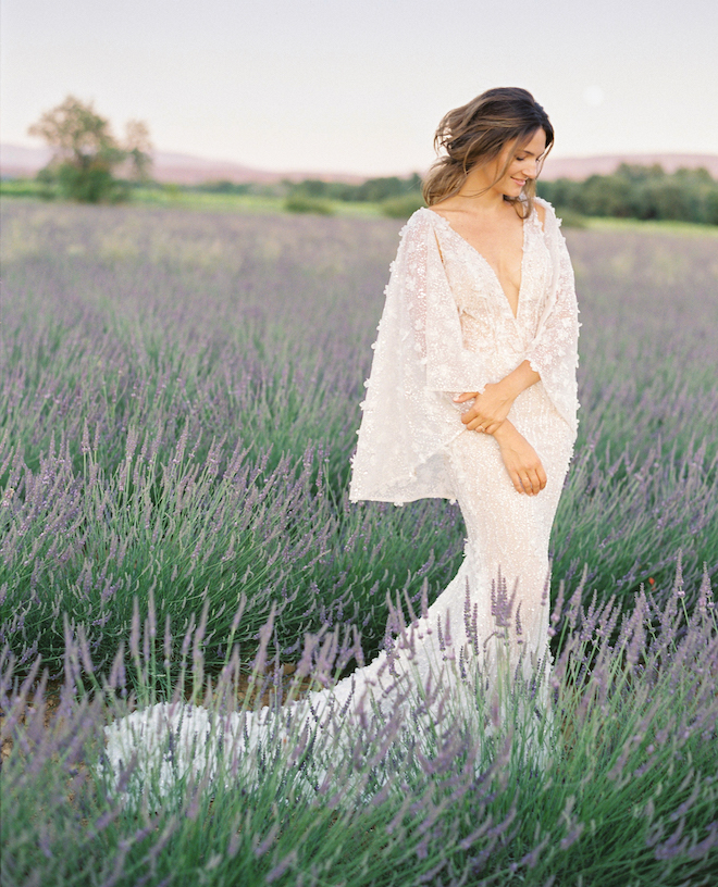 The bride standing in the lavender fields in the South of France.