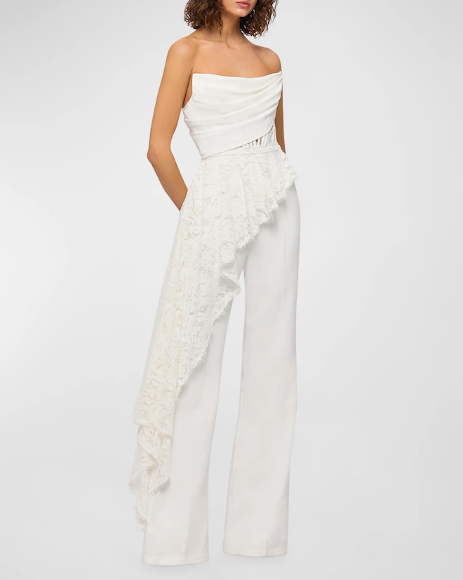 White strapless jumpsuit with a lace layer.
