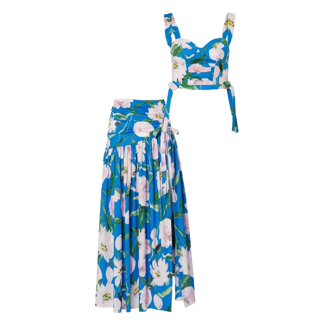 A matching blue corset top and midi skirt with a pink and green floral print. 