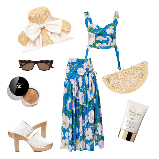 A sunhat, sunglasses, Chanel bronzer, white sandals, a blue floral top and skirt, a straw half-moon clutch and a sunscreen all in the 2023 Honeymoon Essentials in Weddings in Houston Magazine.