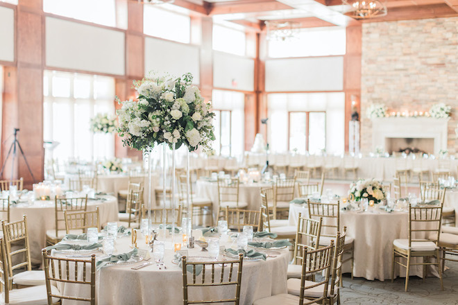 White, sage and blush decor at the wedding reception. 