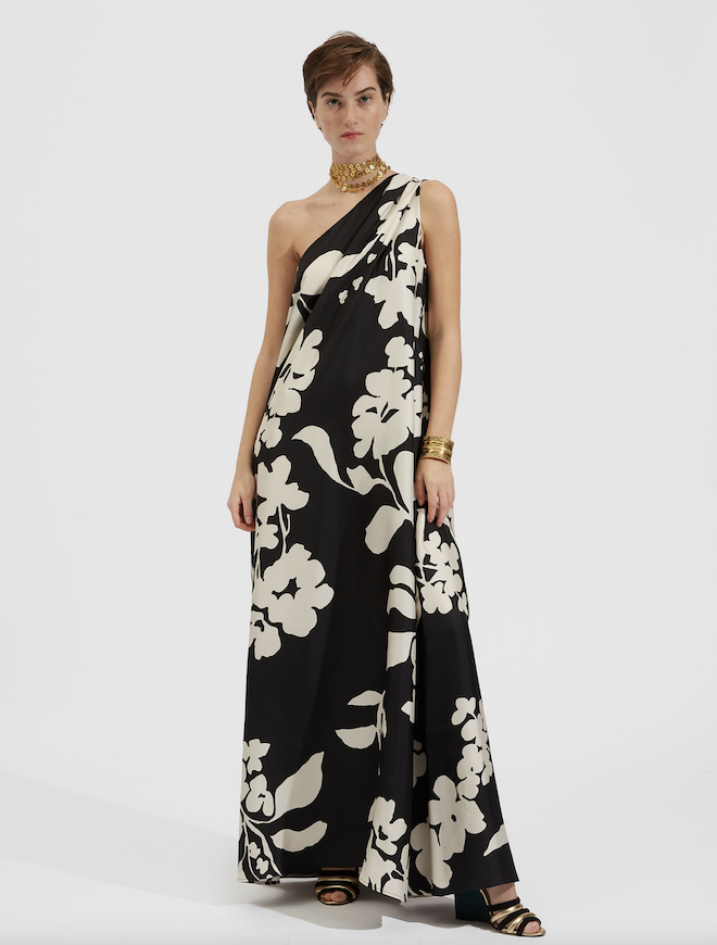 A one-shoulder black and white floral-print dress.