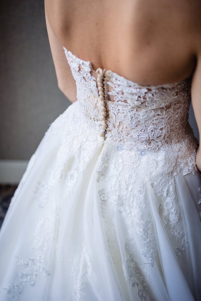 The back of the strapless wedding gown.