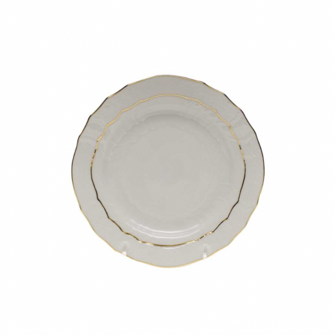 White bread and butter plate with golden edge by Herend available at Bering's Hardware in Houston, TX