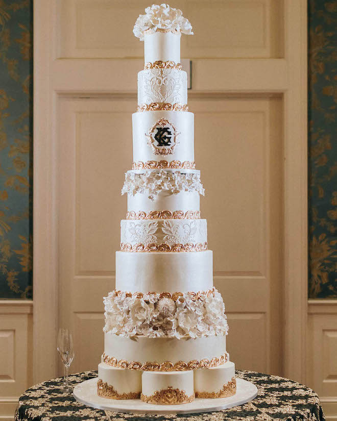 9 tier white and gold custom wedding cake decorated with hand-crafted florals by Houston baker, Cakes by Gina