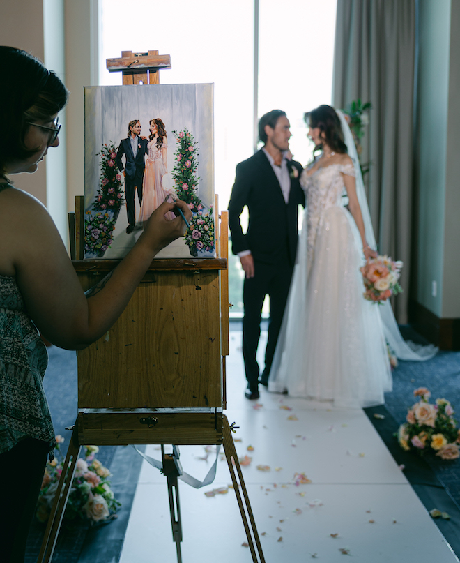Rendered Moments painting the couple looking at each other at the altar. 