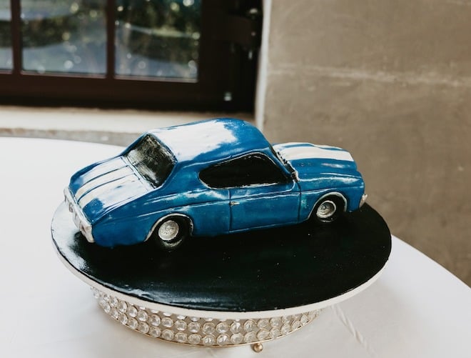 A blue car groom's cake.