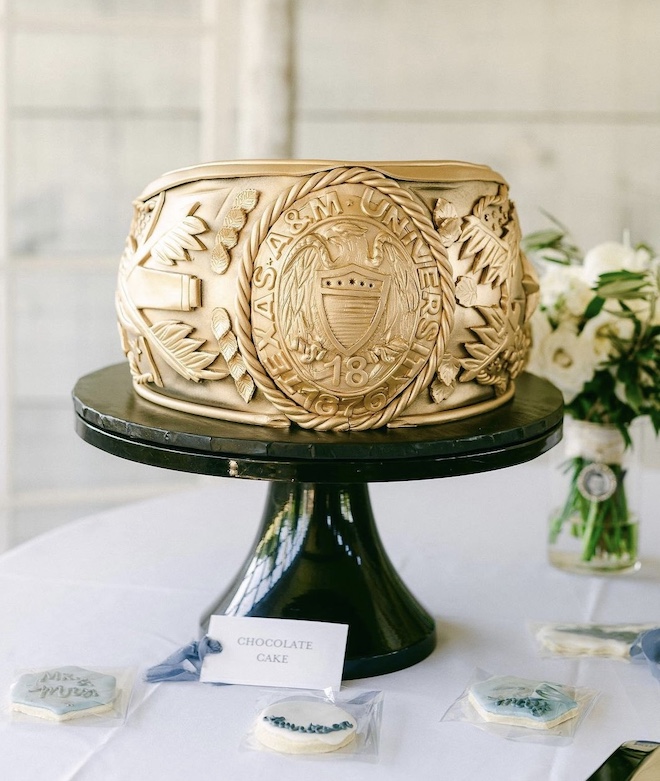 Sweet Treets Bakery designed a groom's cake in the shape of a Texas Aggie ring. 