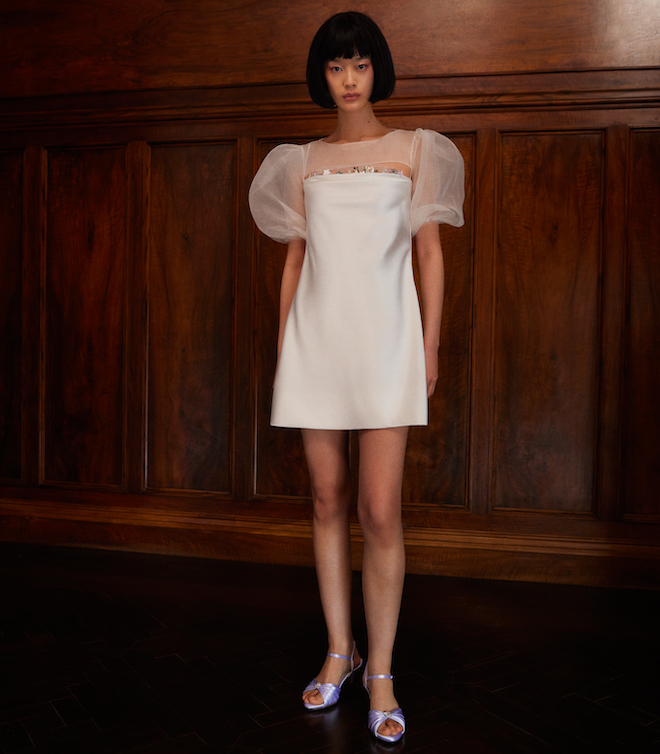 A satin mini dress with tulle puffy sleeves. 