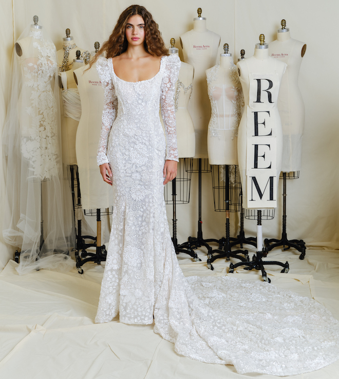A lace gown with structured long sleeves by Reem Acra. 