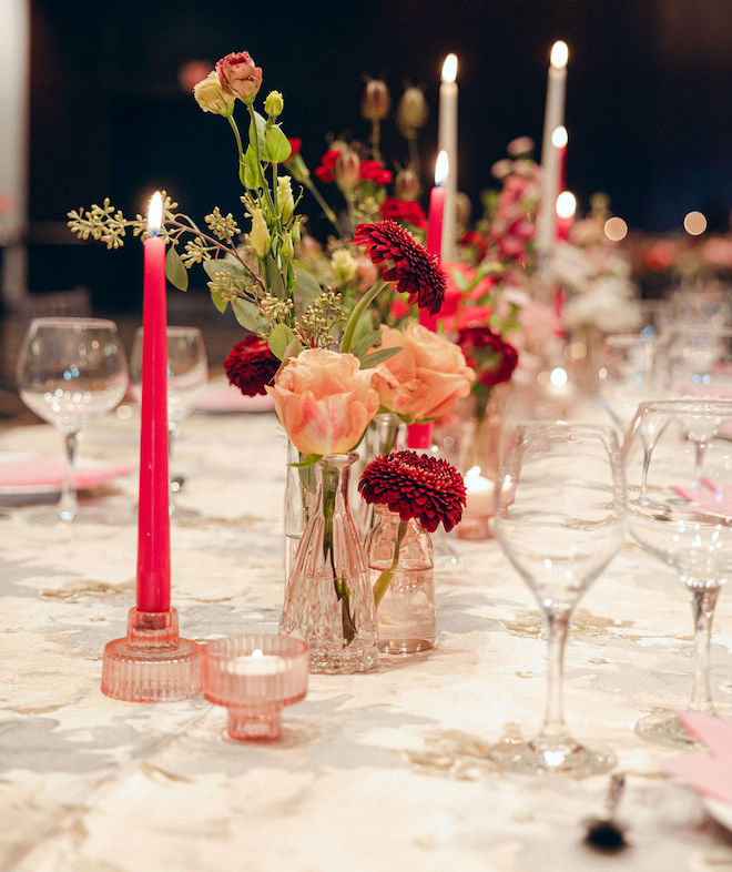 Pink florals, fine china and candles decorate the tablescapes at this Houston wedding editorial at the Royal Sonesta Houston Galleria. 
