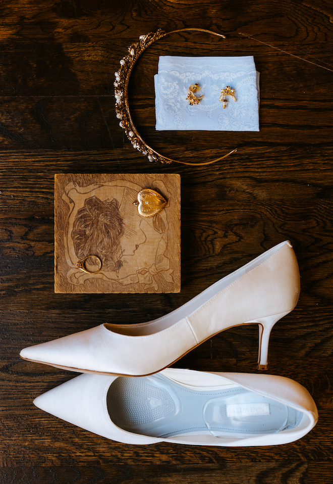A flat lay of the bride's accessories and shoes for her wedding day in Houston.
