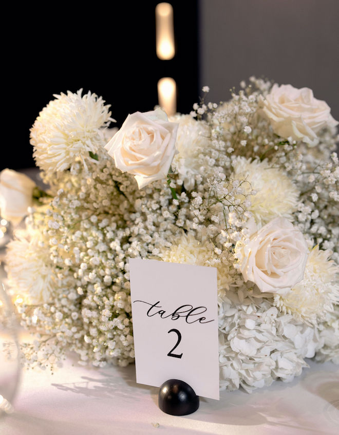 Black and white stationery are used as table number for this old Hollywood wedding editorial at Hyatt Regency Baytown Houston. 