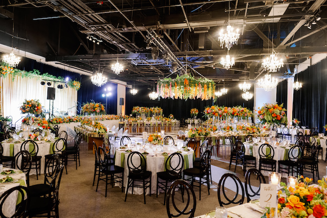 A vibrant downtown wedding reception at the Ballroom at Bayou Place. 