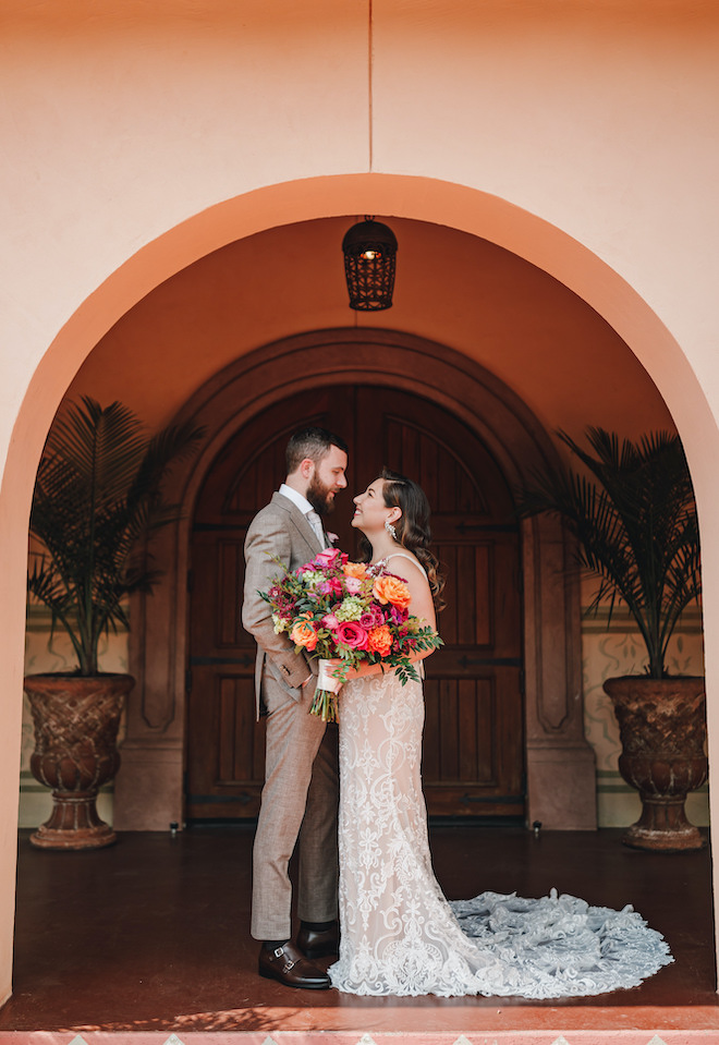 The bride and groom wed with a colorful wedding day at Madera Estates. 