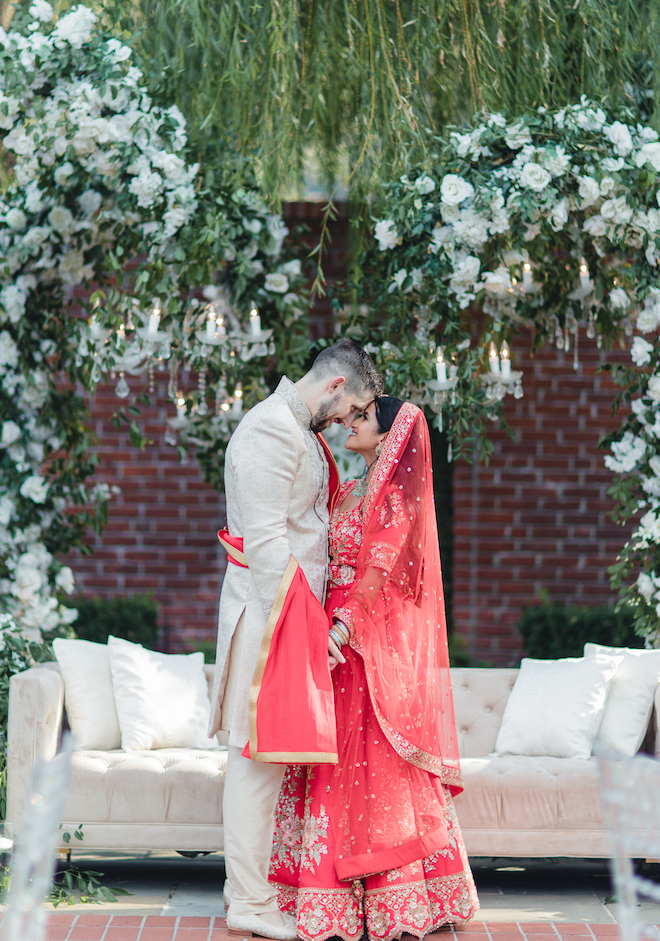 The bride and groom look into each others eyes at their Houston wedding featured in the Weddings in Houston magazine.